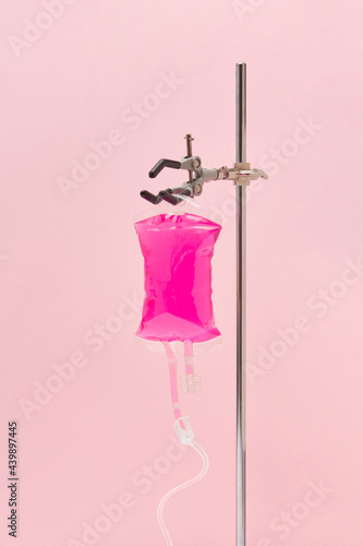 Drop counter with pink liquid photo