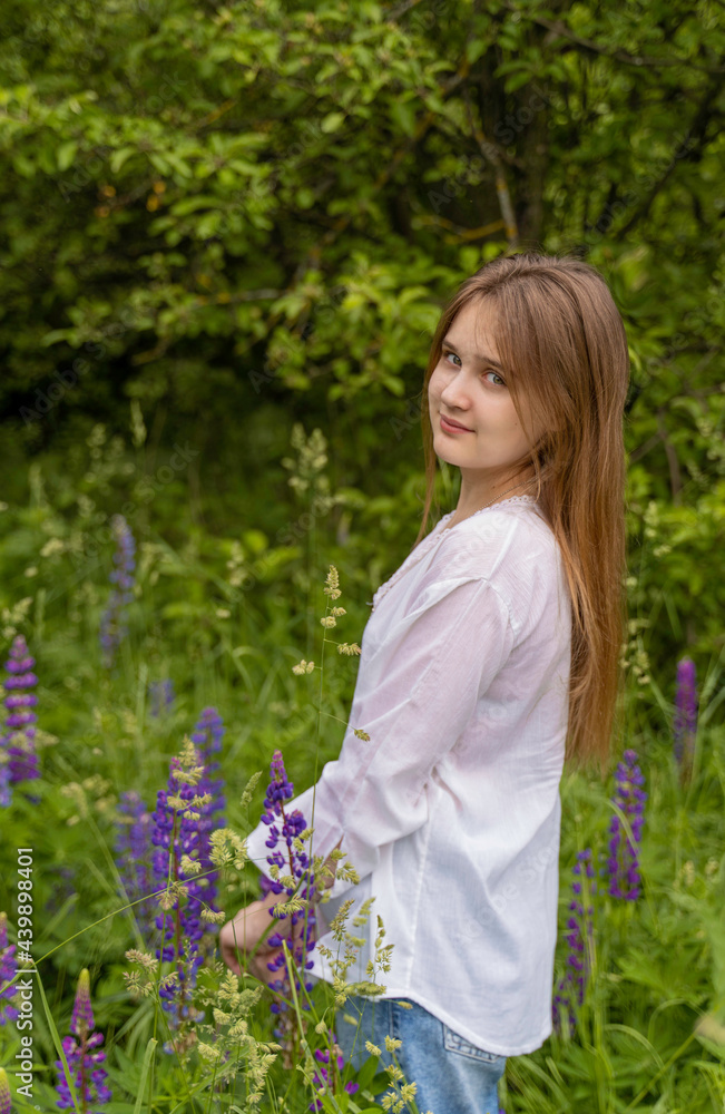 Young woman in a green meadow Young woman in a green meadow