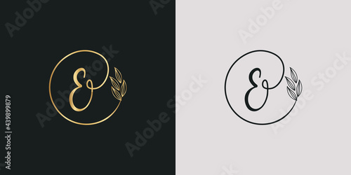 luxury golden signature letter E isolated circle with leaves ahead. vector monogram for cosmetic, restaurant, boutique, hotel , nature logo concept vector