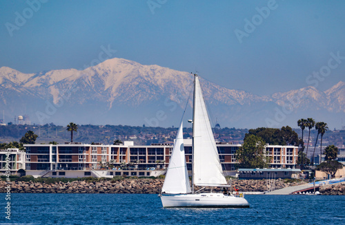 View of the land in Southern California at Marina del Rey with the snow capped mountains in the background.  © julie