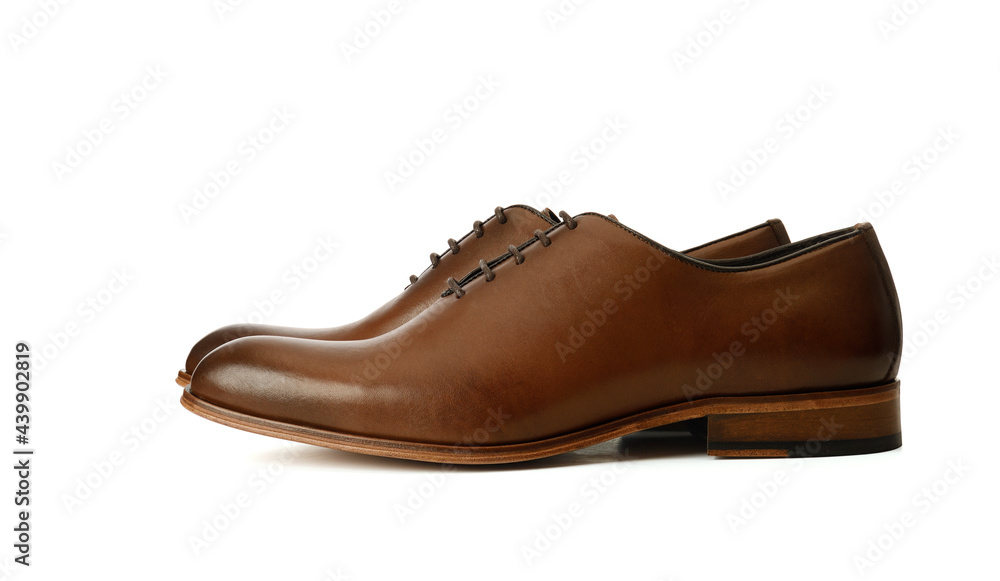Men's brown oxford fashion shoes isolated on a white background. Men's brown oxford fashion shoes isolated on a white background.