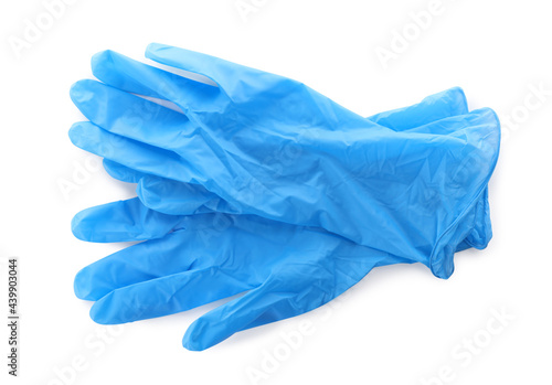 Medical gloves on white background, top view