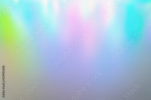 blur, grain, and texture of iridescent holographic abstract aurora light neon colors background. blurred pastel multicolored backdrop from glowing lights