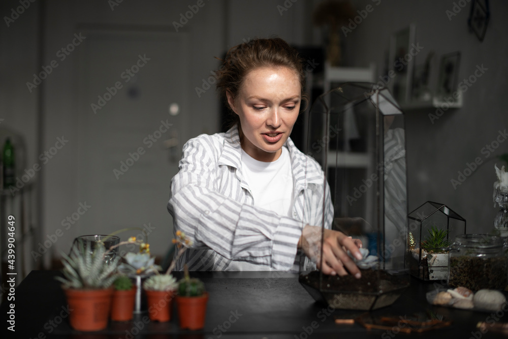 Woman Planting Succulent In Florarium Woman Planting Succulent In Florarium