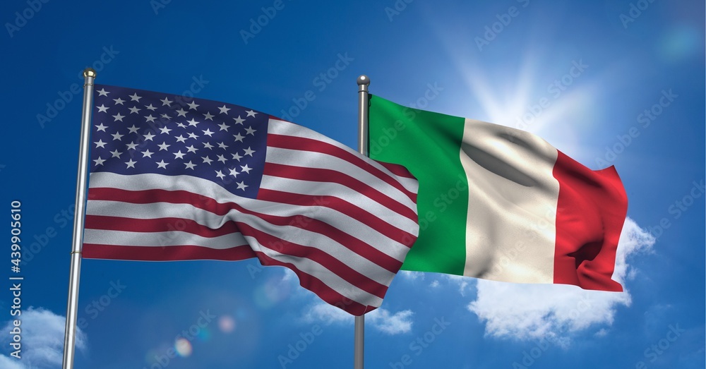 Fototapeta premium American and italian flag waving against clouds in blue sky