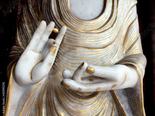 Detail of Bhuddist statue with hands in a mudra position