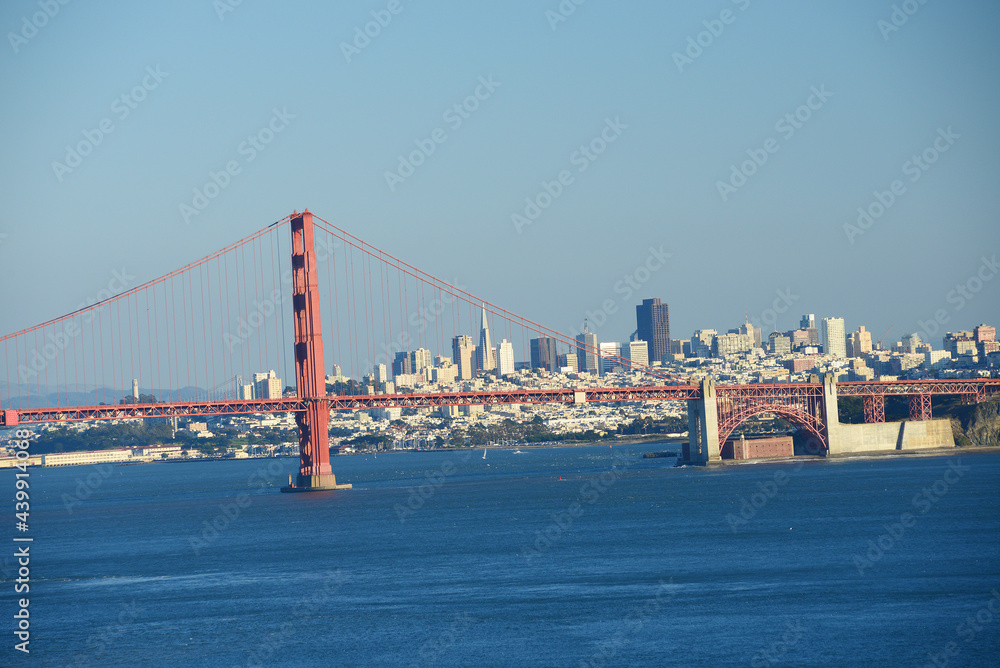 Golden Gate Bridge with blue sky and city of San Francisco