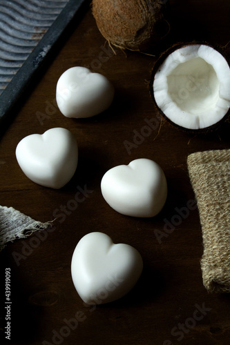 Photos of coconut oil-based household soap in the shape of a heart