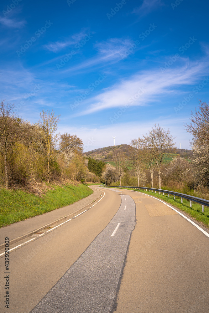 Fototapeta premium Street in the landscape with blue sky 