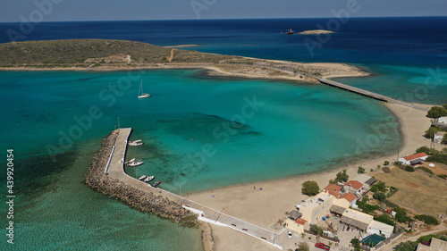 Aerial drone photo of main port of Kythera island and turquoise exotic beach of Diakofti, Ionian, Greece photo