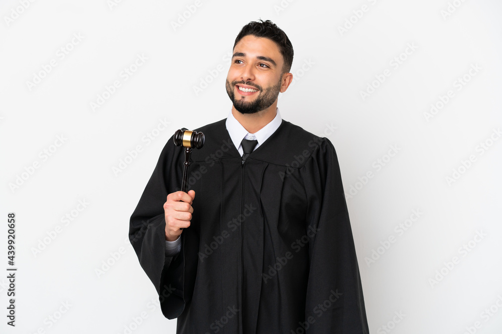 Judge arab man isolated on white background thinking an idea while looking up Judge arab man isolated on white background thinking an idea while looking up