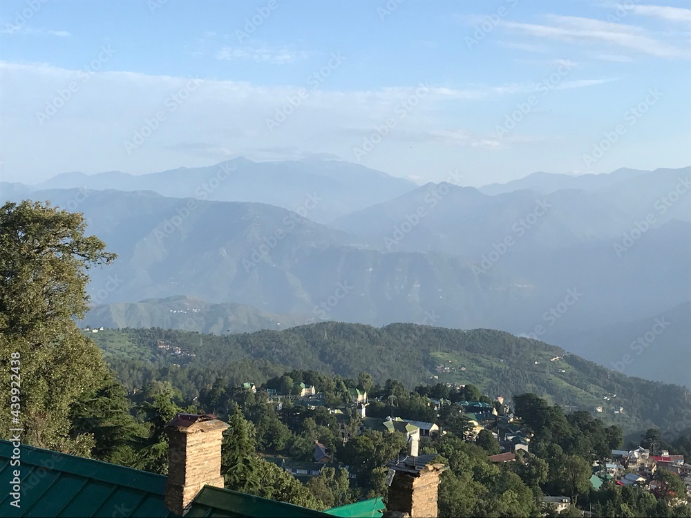 Fototapeta premium A picture of Himalayan mountains and valleys from a high point in the hill station of Dalhousie, in Himachal Pradesh of India.