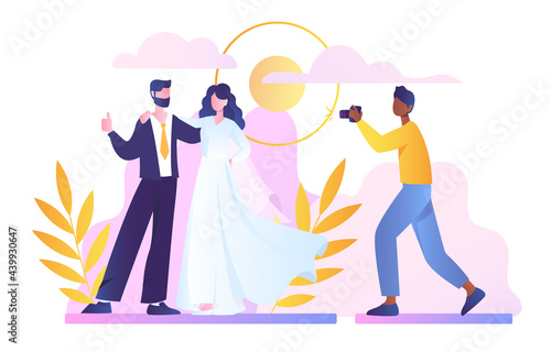 Bride and groom pose on wedding ceremony for shoot