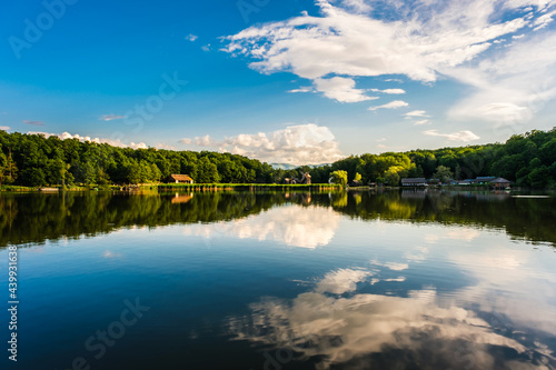 clouds in the blue sky reflecting in the lake