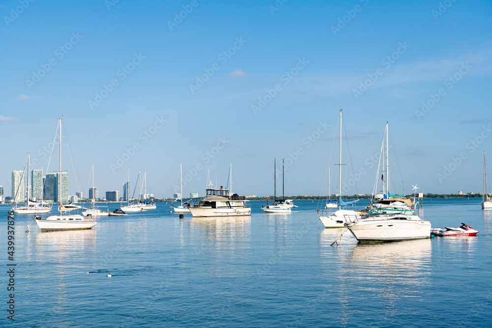 Sail boats at moorage in sea of Miami, USA