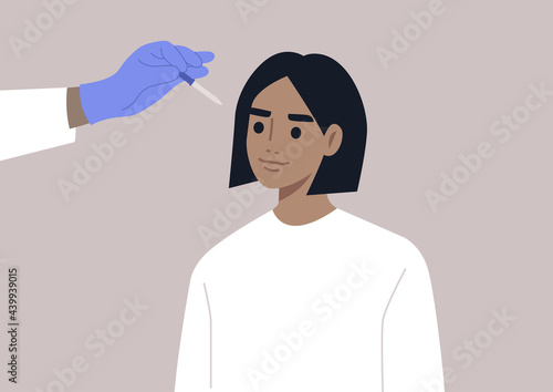 A doctor instills eyedrops with a pipette, ophthalmologist checkup, eye hygiene