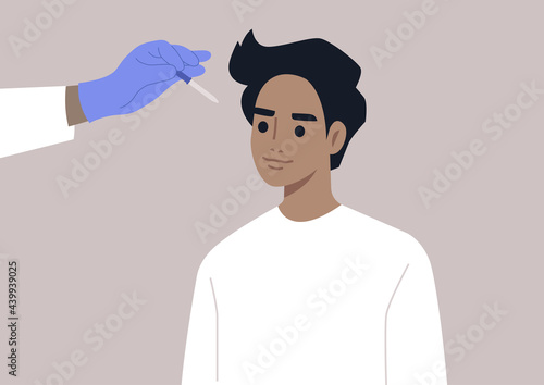 A doctor instills eyedrops with a pipette, ophthalmologist checkup, eye hygiene