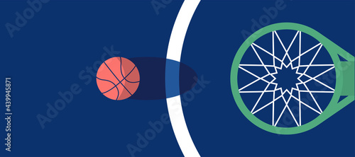 basketball ball in the air going to the hoop.