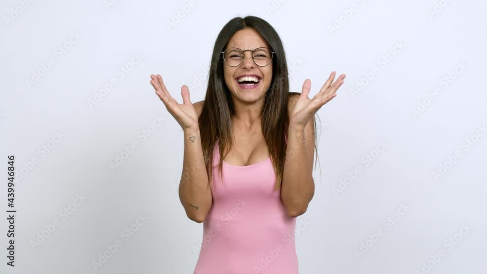 Young woman with glasses with surprise and shocked facial expression over isolated background Young woman with glasses with surprise and shocked facial expression over isolated background