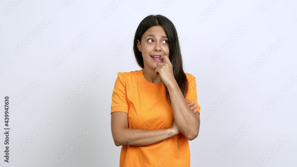 Young woman having doubts and questioning an idea over isolated background Young woman having doubts and questioning an idea over isolated background