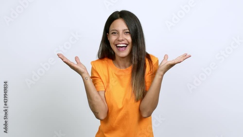 Young woman with surprise and shocked facial expression over isolated background