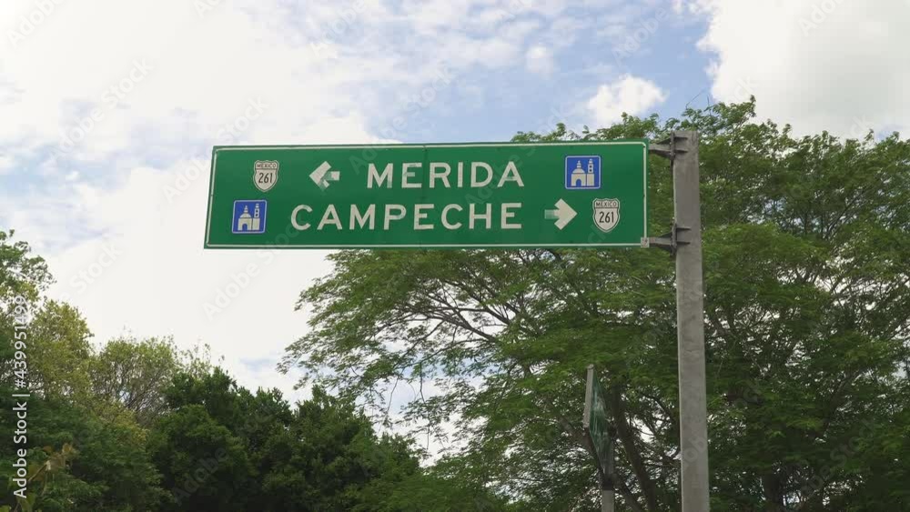 Directional signpost showing directions to the Merida and Campeche
