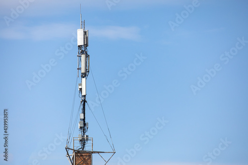 communication tower top. Radio antenna Tower , microwave antenna tower on light sky background. wireless technology concept. communication development concept. image for objects and article.