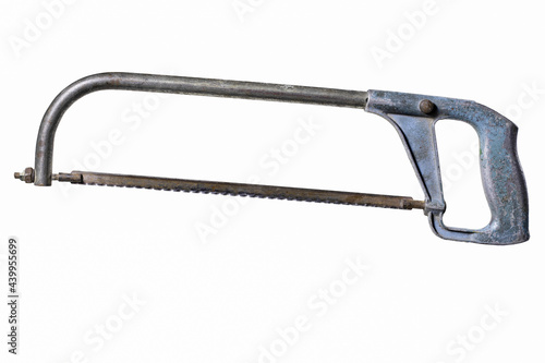 A saw with a blade for cutting metal. Tools used in a locksmith's shop.