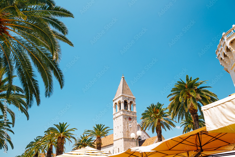 Trogir old town street and palm trees in Croatia