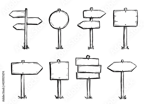 Hand drawn set of road direction sign. Doodle sketch style. Sign with wood plank. Grunge vector illustration.