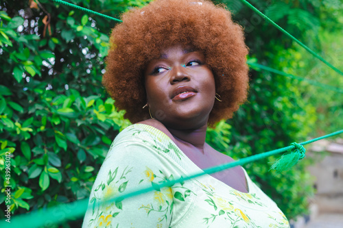 woman in green in her garden.