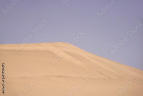 desert dune silhouette with sky background