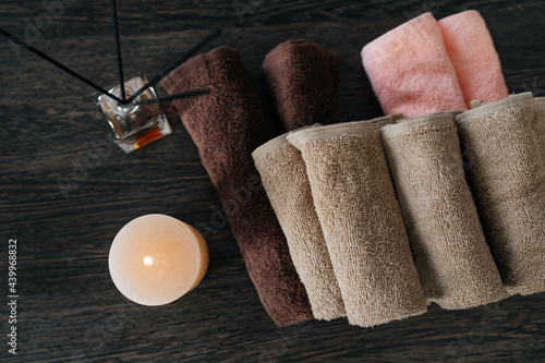 SPA-center. Towels, aromatic oil and candles in the massage parlor. View from above