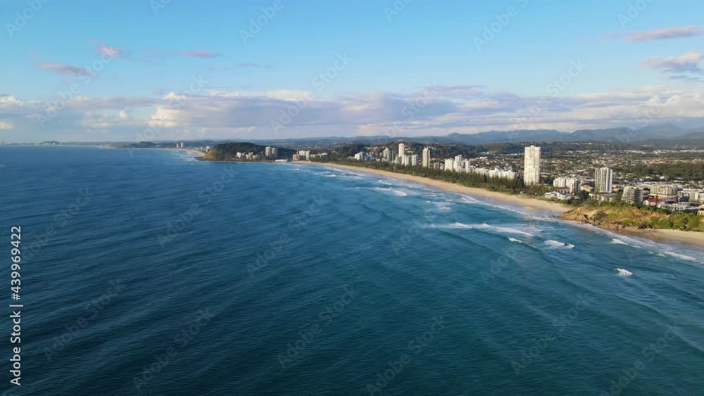 Beach In Burleigh Heads And The Skyscrapers At The Coastline In The Australian City Of Gold Coast. aerial Beach In Burleigh Heads And The Skyscrapers At The Coastline In The Australian City Of Gold Coast. aerial