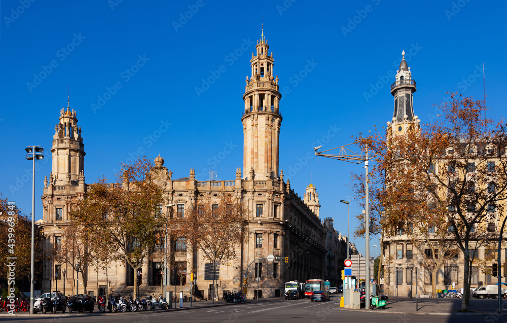 Elegant building of Central Post Office of Barcelona on Passeig de Colom in sunny winter day, Spain