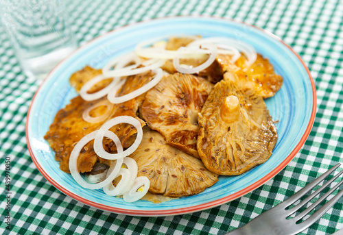 Salad bowl with pickled russula and onions