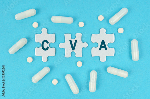 On a blue background, there are pills and puzzles with the inscription - CVA