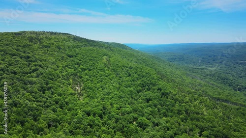 Aerial drone footage of Shawangunk Mountains during summer in New York’s Hudson Valley. The Shawangunks are a sub-range of the Appalachian Mountains on the east coast of United States photo