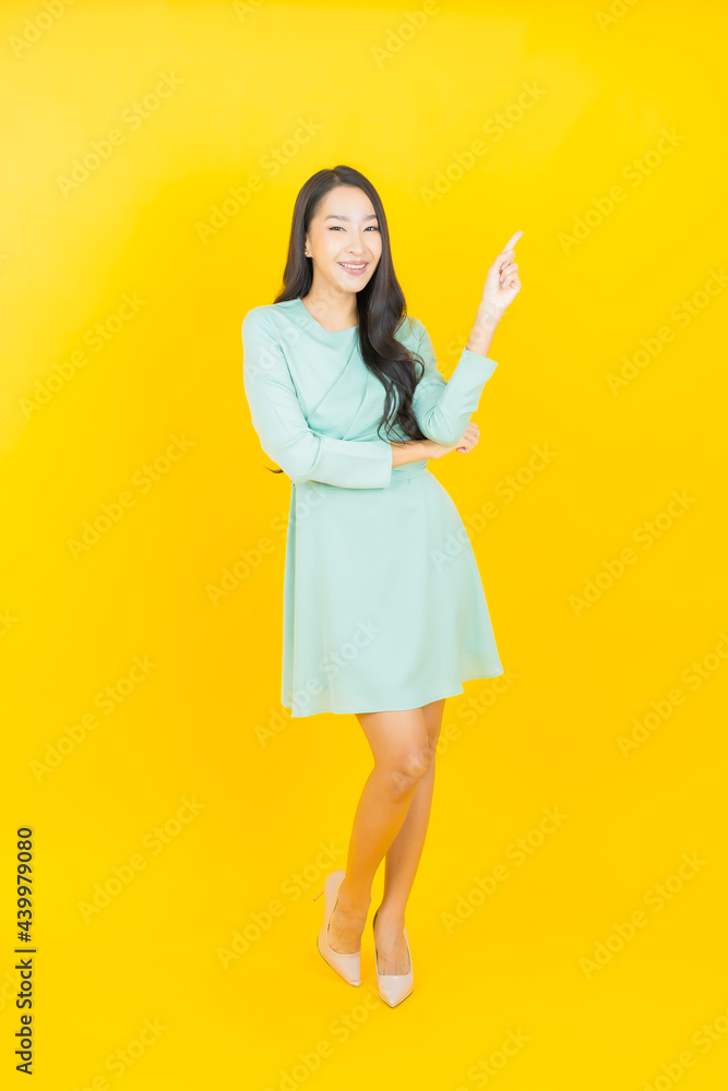 Portrait beautiful young asian woman smile with action Portrait beautiful young asian woman smile with action