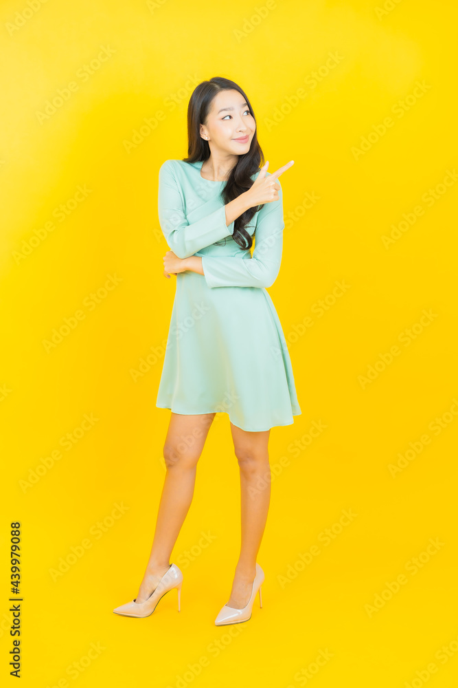 Portrait beautiful young asian woman smile with action Portrait beautiful young asian woman smile with action