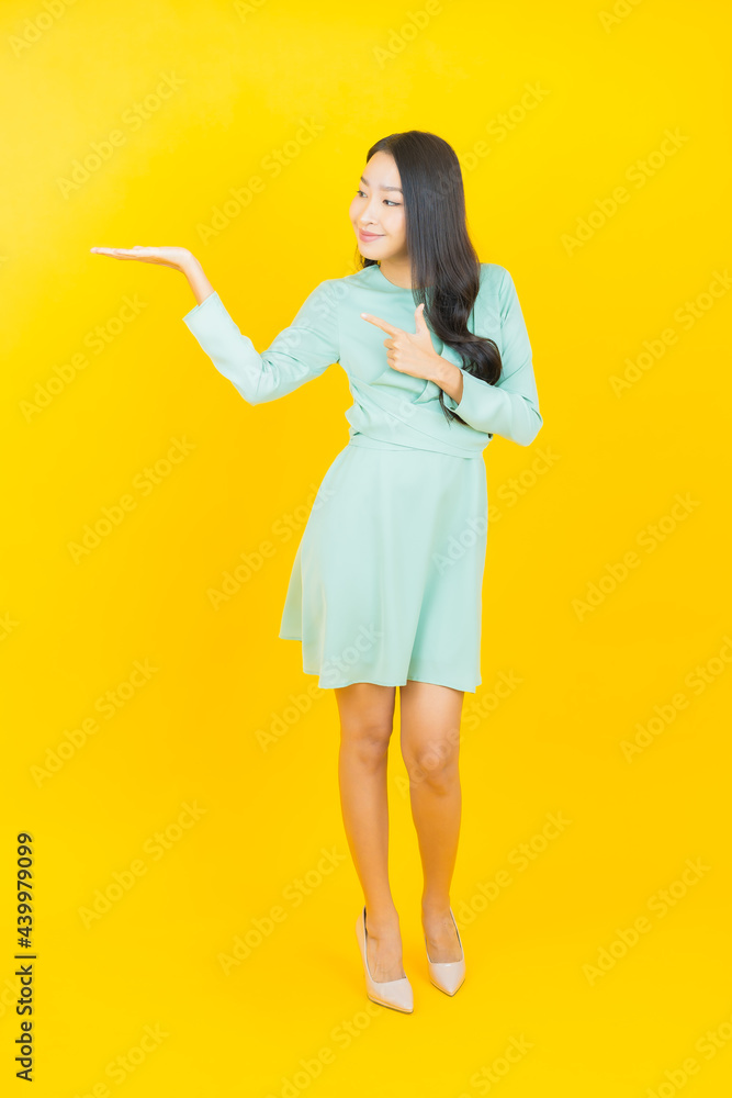 Portrait beautiful young asian woman smile with action Portrait beautiful young asian woman smile with action
