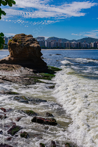 Niterói, Rio de Janeiro, Brazil - CIRCA 2021: Image of rock formations (stones), with texture and sharpness, on the beach during the day photo