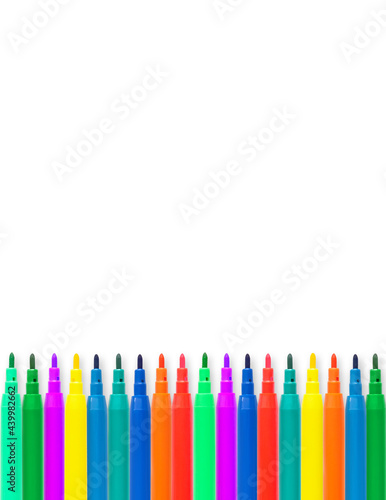 Colored markers on a white background