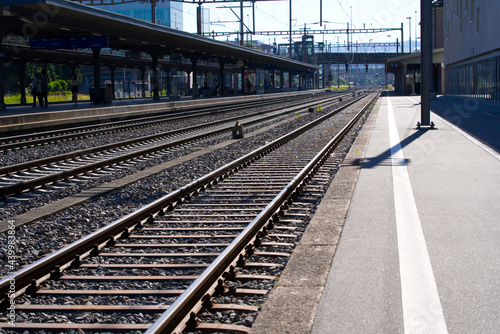 Train station Schlieren Canton Zurich with backlight on a beautiful summer day. Photo taken June 15th, 2021, Schlieren, Switzerland.