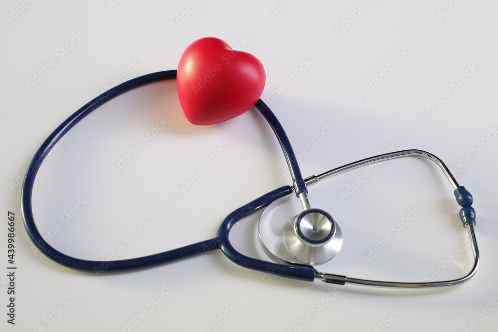 Medical stethoscope heart on white background. Close up Medical stethoscope heart on white background. Close up