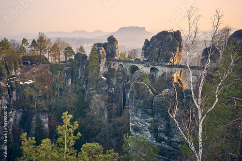 Bastei mit Basteibrücke in der Sächsischen Schweiz bei Sonnenuntergang - Blick vom Ferdinandstein photo