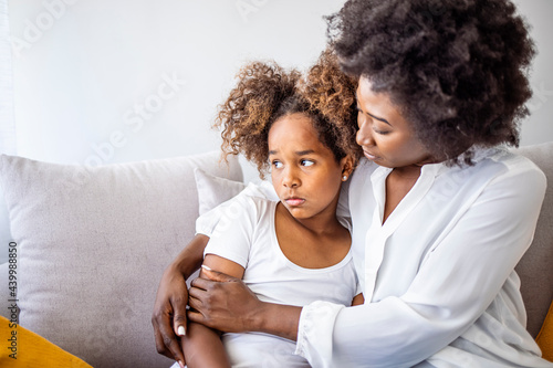 Картината върху платно Loving mother consoling or trying make peace with insulted upset stubborn kid da