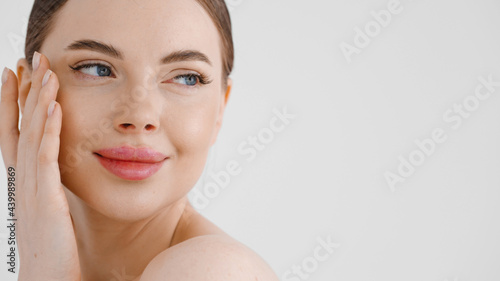 Beautiful woman clean skin healthy beauty face close up natural make up isolate don white natural 