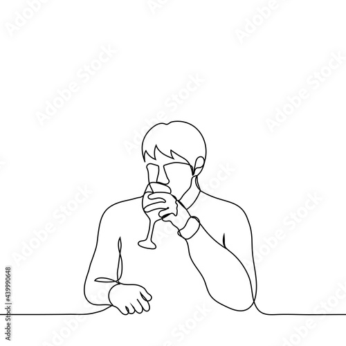 man sitting at a table or a bar counter drinks from a glass of wine - one line drawing. male taster, alcoholic, wine gourmet, winemaker trying his products,