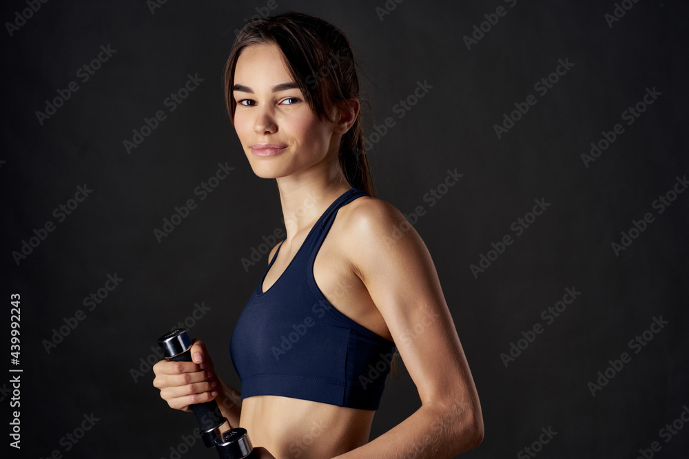 pretty brunette with dumbbells in hands sports figure exercise fitness pretty brunette with dumbbells in hands sports figure exercise fitness
